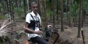 مزارع هندى يخترع " مصعد " لتسلق الأشجار ( فيديو )